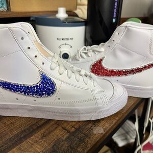 Nike White Sneakers with Red and Blue Accents